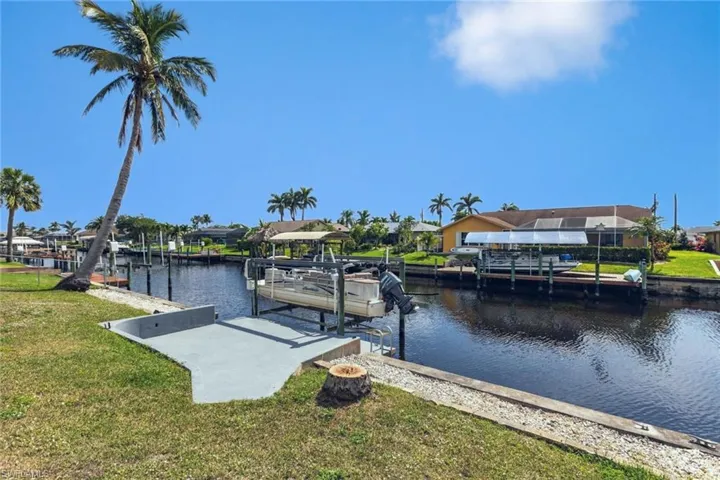Backyard with dock and lift.