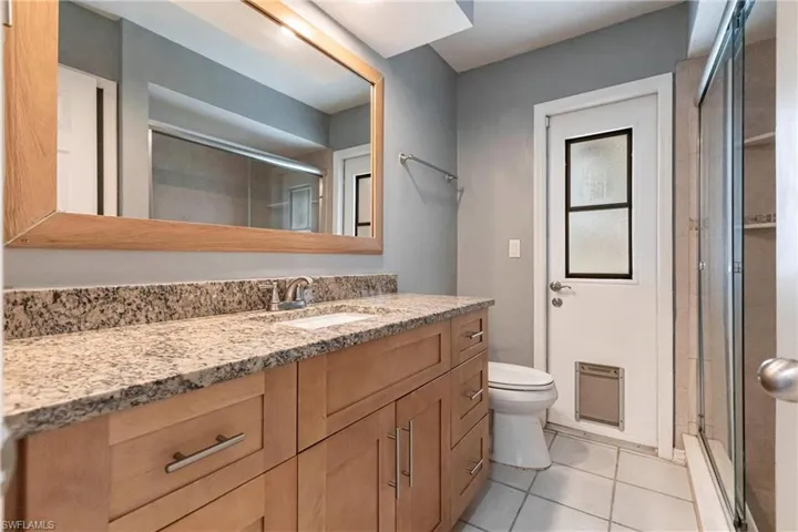 Guest bathroom with pool access