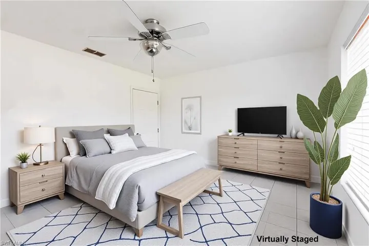 Bedroom 2.  Virtually staged.