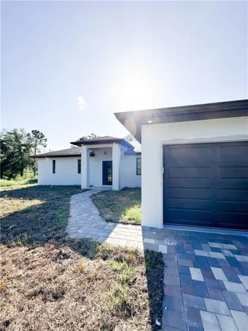View of front of home featuring a garage