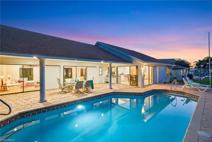 Outdoor pool with a patio
