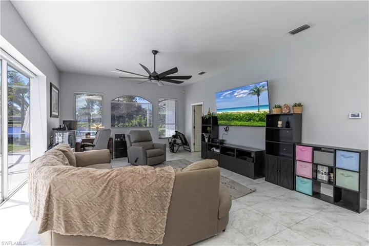 Family room w/ ceiling fan