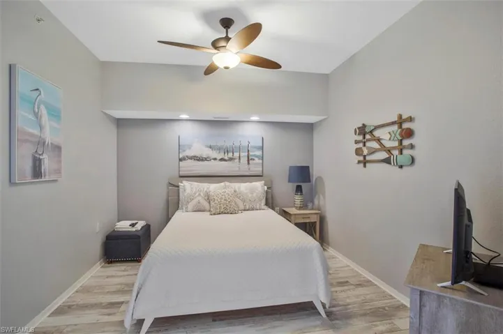 Den with pocket door and serves as third bedroom
