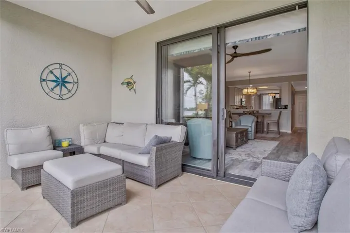 Breakfast room off of kitchen opens to front lanai.