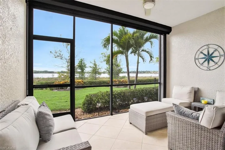 Rear patio featuring a wealth of natural light and expansive LAKE views