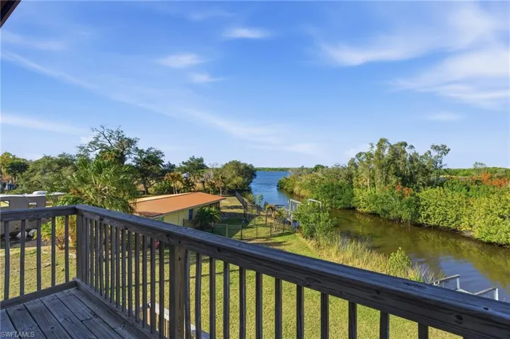 Wooden deck with a water view