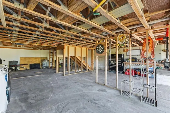 Misc room with unfinished concrete flooring