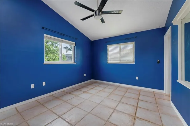Tile floors, ceiling fan, vaulted ceiling