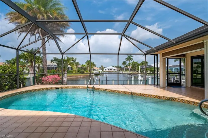 Screened enclosure and canal view