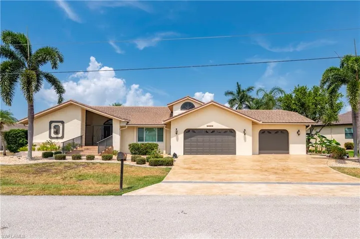 Welcome to 5005 Ussepa with 3 car garage and large driveway