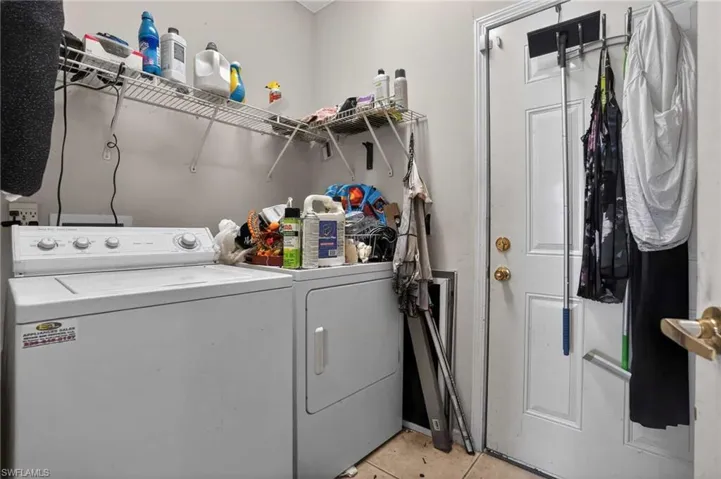 Laundry room featuring independent washer and dryer