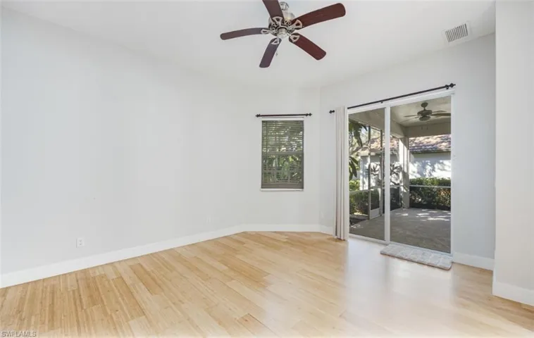 Master Bedroom with wood floors