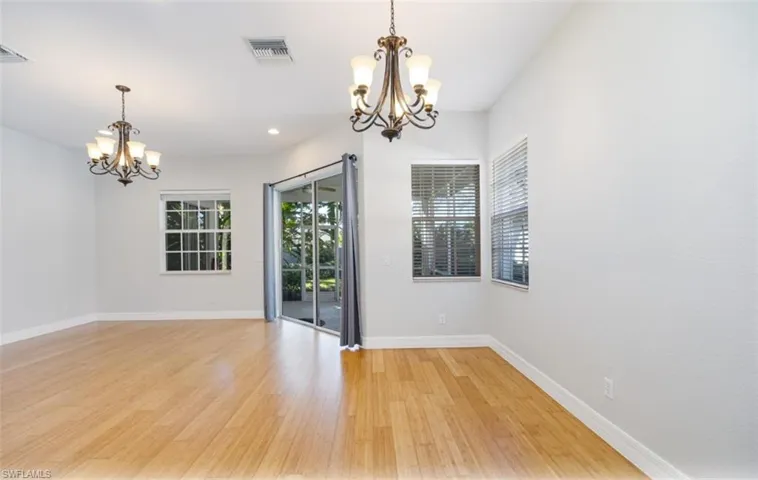 Bright living room with lanai access