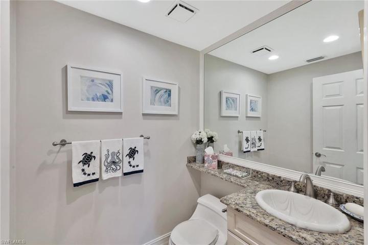 Powder room is just off living area.