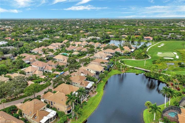 Aerial view of lake behind the home.