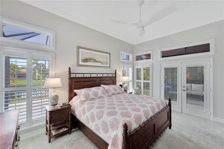 Spacious primary suite with access to the lanai.