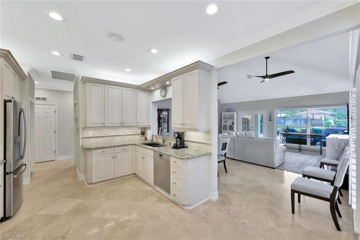 Garage is conveniently located just off the kitchen to the left.