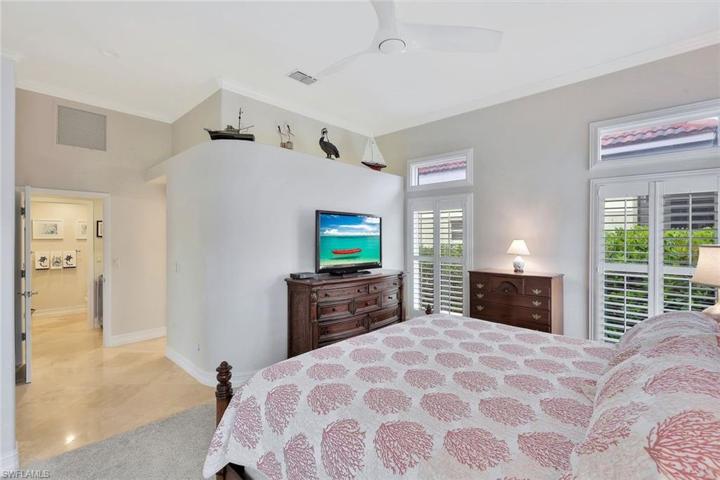View of primary bedroom from lanai door.