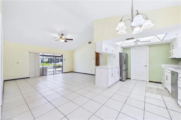 Open Floorplan. Kitchen has full stove, refrigerator, microwave and dishwasher.