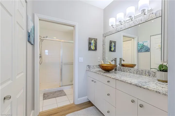 Master Bathroom with separate sink vanity area