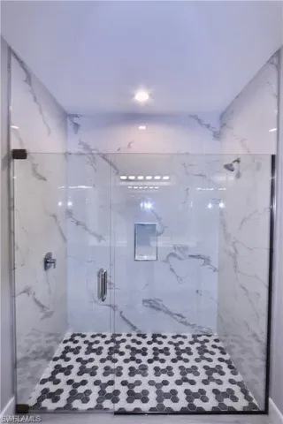 Bathroom featuring an enclosed shower