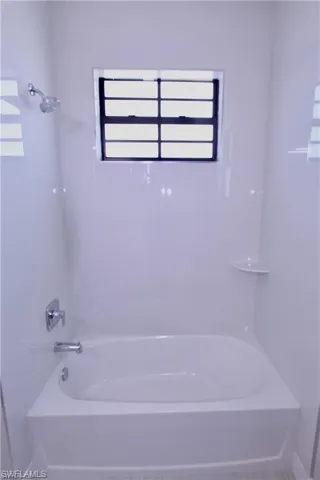 Bathroom featuring shower / bathtub combination