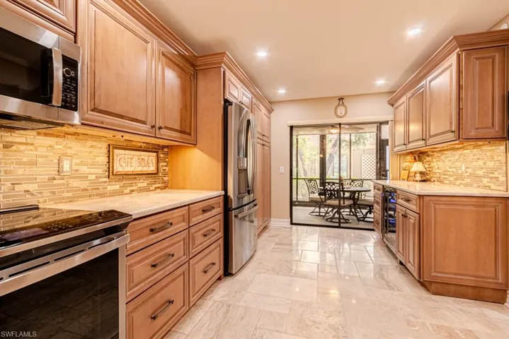 Kitchen overlooking greeting lanai.