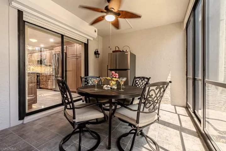 Greeting room featuring light tile patterned floors and ceiling fan