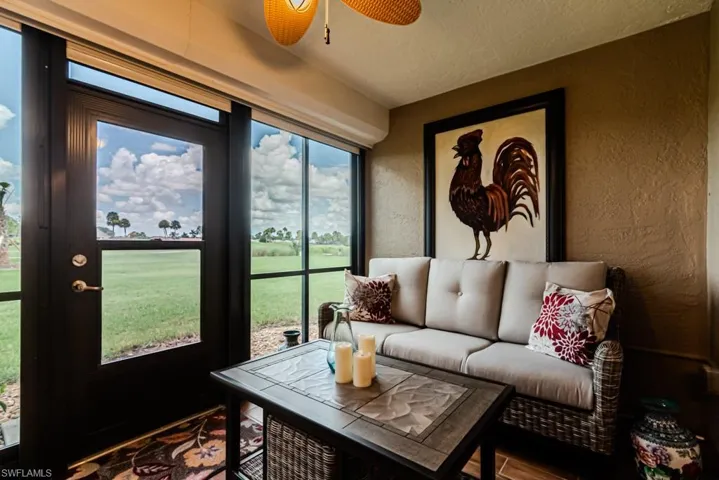 Lanai with high end acrylic sliders and roll down storm shutters.