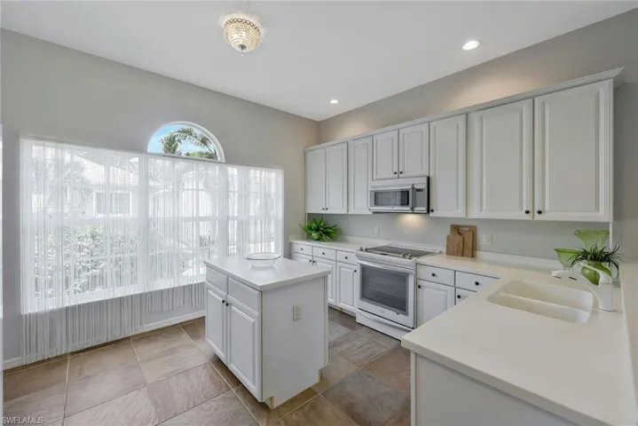 All the Elements of a Great Kitchen: Natural Light, Counter Space, and Copious Storage!