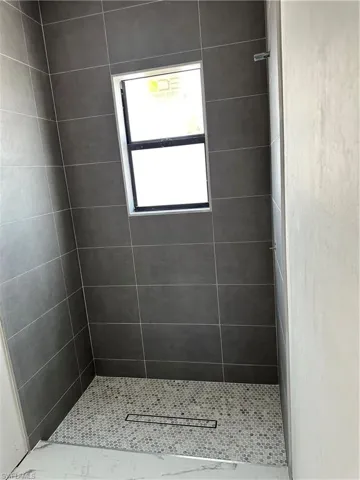 Guest bath shower with same modern design