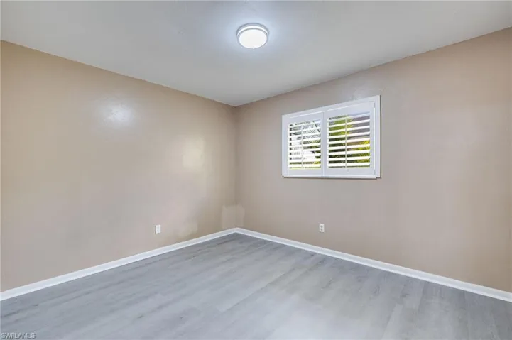 Empty room with light wood-style floors