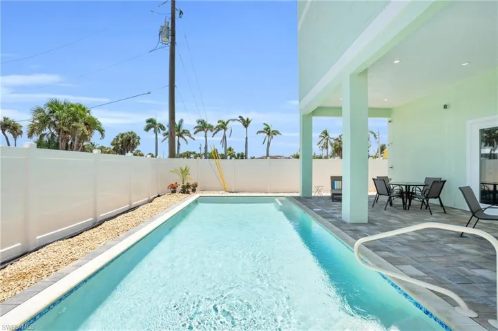 View of pool with a patio area