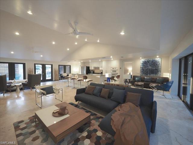Living room with high vaulted ceilings