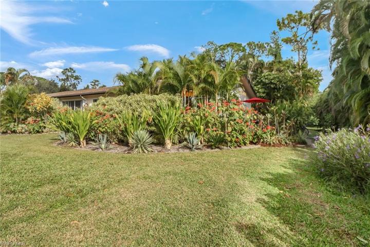 Very private corner unit with lots of green space