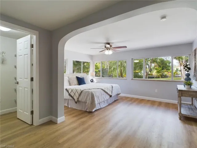Primary bedroom overlooking backyard