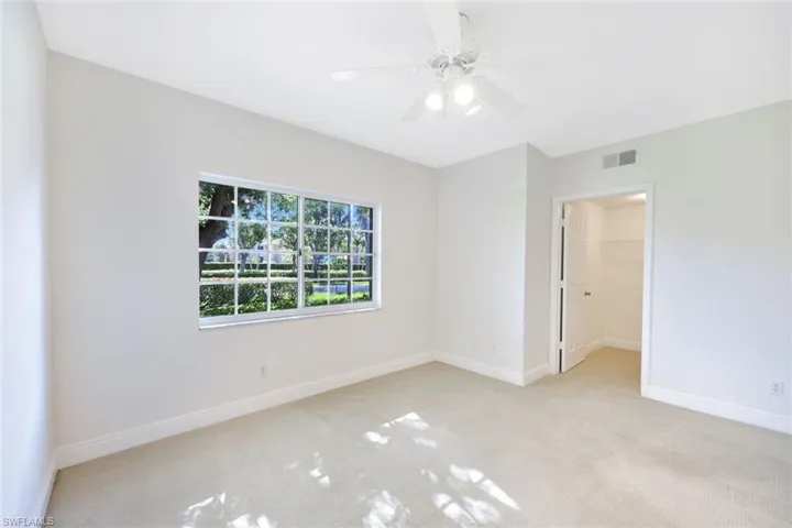 Second bedroom offers spacious walk-in closet.