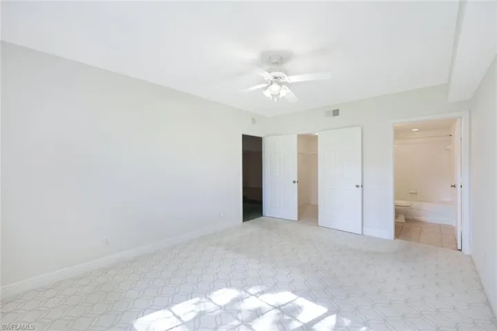 Large primary bedroom with en suite bathroom.