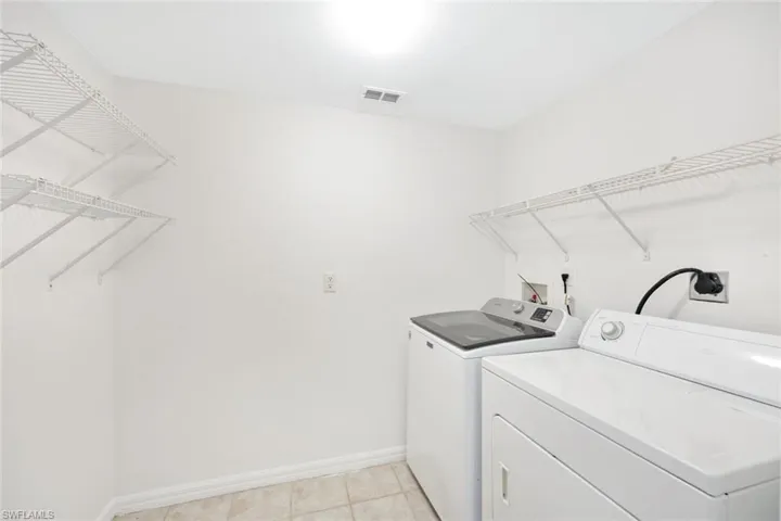Spacious laundry room.