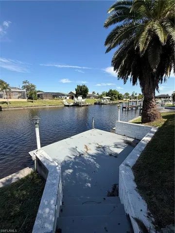 Dock featuring a water view