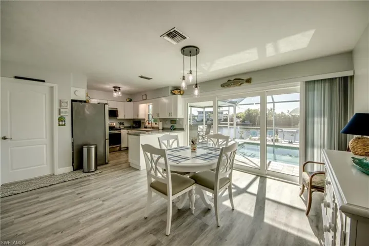 Dining space featuring light hardwood / wood-style flooring