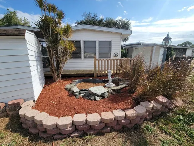 Side of home garden and shed.
