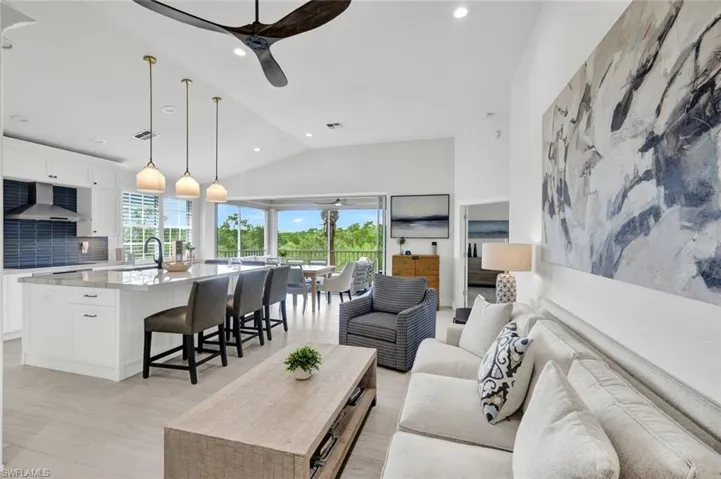 Beautifully reimagined upper-level home, located close to the South Gate of Bonita Bay.