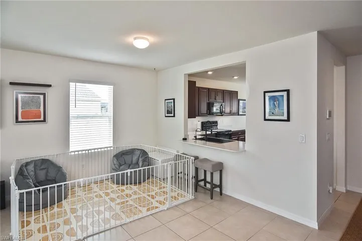 Dining area, open to kitchen with bar top