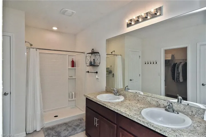 Double sinks, walk-in shower