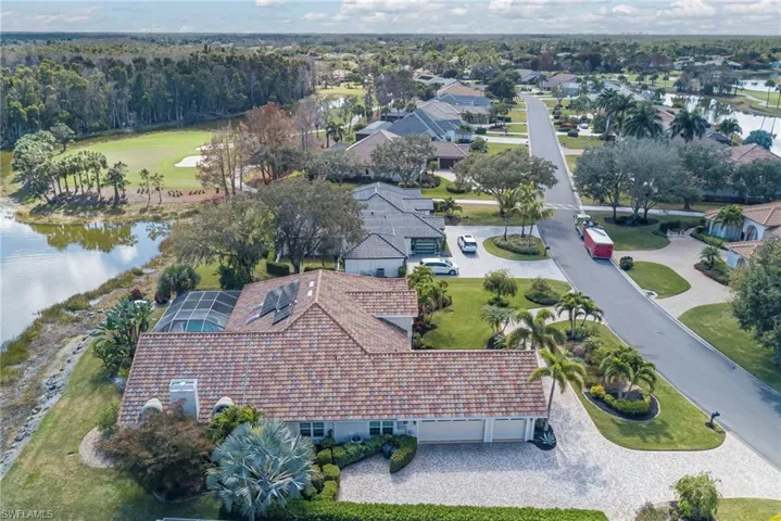 Aerial view of a golf club and a nearby body of water