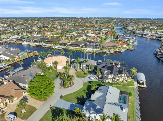 View of property location with nearby suburban area