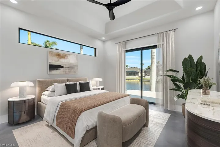Living room featuring a high end fireplace, beamed ceiling, ceiling fan, and recessed lighting