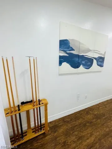 Detailed view of wood finished floors and baseboards