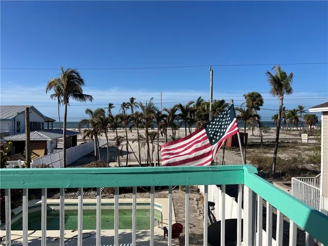 Current View  off deck with a swimming pool